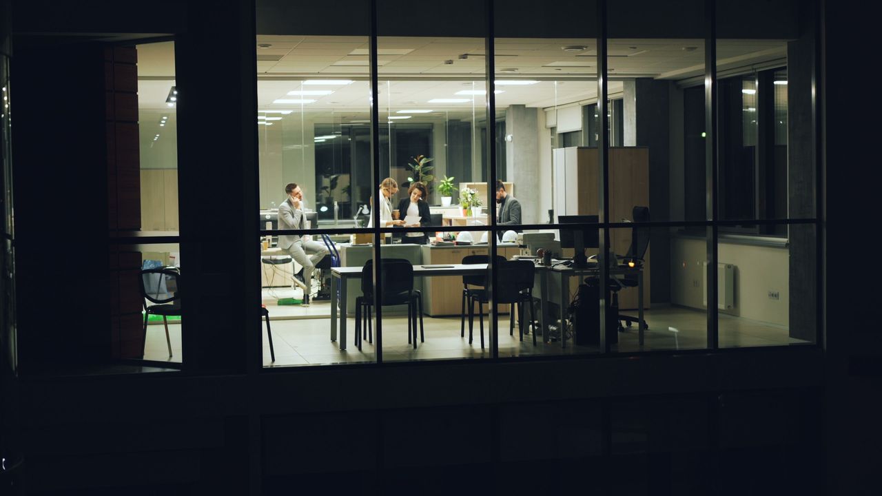 Bright coworking space with long shared desks